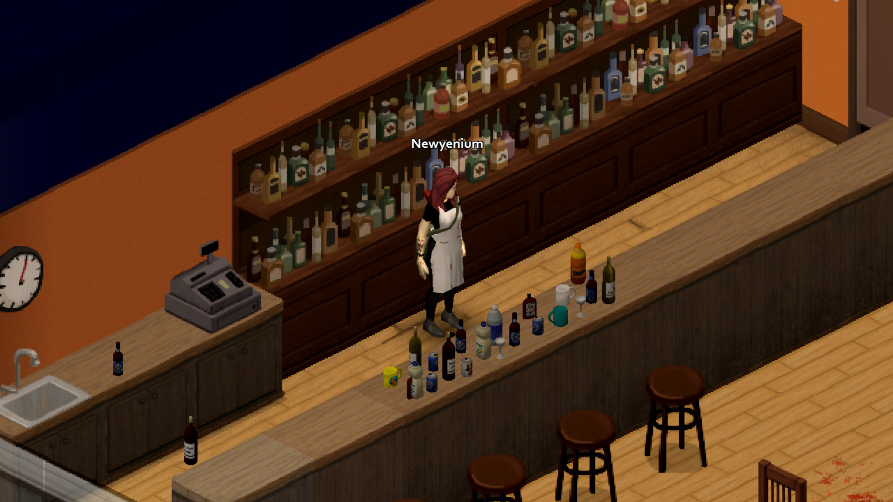 A selection of beverages, such as wine and bourbon, on a table